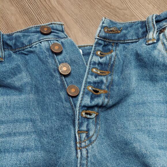 KanCan Junior's Medium Wash Button Fly Distressed Raw Hem Blue Denim Jean Shorts - Picture 4 of 6